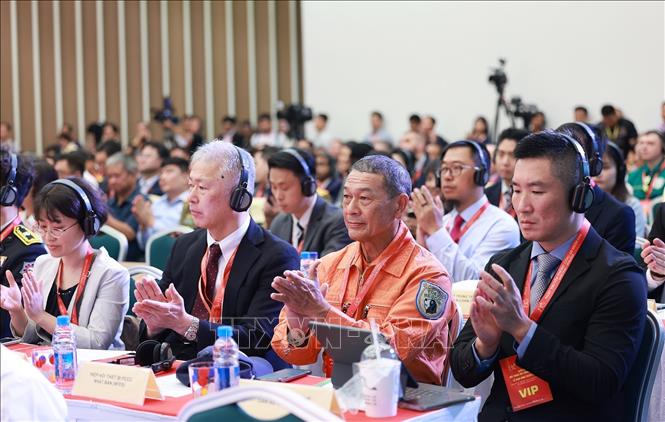 Đại biểu quốc tế tham dự Diễn đàn. Ảnh: Dương Giang-TTXVN 