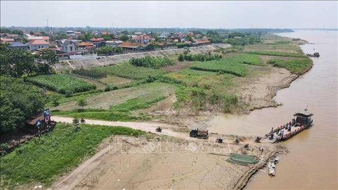 Từ một xã đảo còn nhiều khó khăn về giao thông và kinh tế, Minh Châu (Hà Nội) đã vươn mình mạnh mẽ, trở thành một vùng quê trù phú, tươi đẹp. Ảnh: Vũ Quang - TTXVN