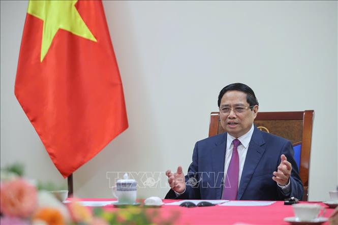 Thủ tướng Phạm Minh Chính điện đàm với Thủ tướng Campuchia Hun Manet. Ảnh: Dương Giang-TTXVN