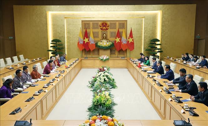 Thủ tướng Phạm Minh Chính hội kiến Quốc vương Bhutan Jigme Khesar Namgyel Wangchuck. Ảnh: Dương Giang– TTXVN
