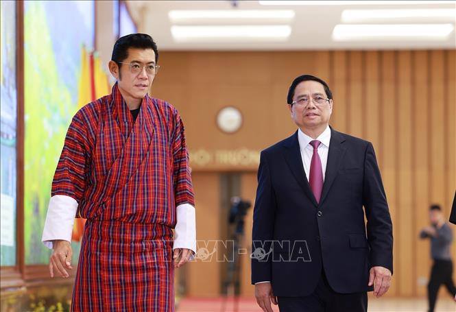 Thủ tướng Phạm Minh Chính hội kiến Quốc vương Bhutan Jigme Khesar Namgyel Wangchuck. Ảnh: Dương Giang– TTXVN
