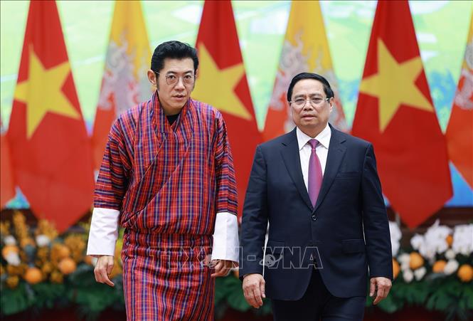 Thủ tướng Phạm Minh Chính hội kiến Quốc vương Bhutan Jigme Khesar Namgyel Wangchuck. Ảnh: Dương Giang – TTXVN