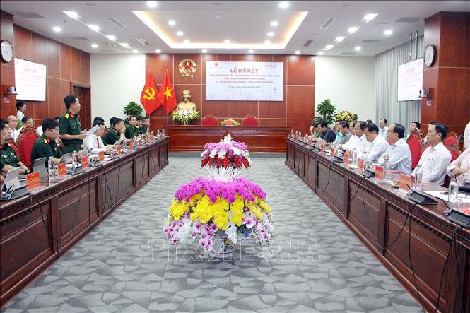 Quang cảnh lễ ký kết. Ảnh: Trung Kiên - TTXVN