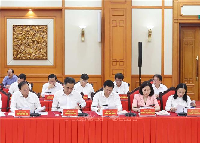 Các đại biểu tham dự buổi làm việc. Ảnh: Thống Nhất – TTXVN