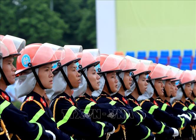 Khối chiến sĩ Phòng cháy chữa cháy và Cứu hộ cứu nạn trước giờ hợp luyện tại Quảng trường Ba Đình. Ảnh: Tuấn Anh - TTXVN