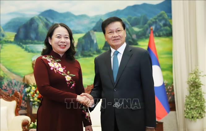 Tổng Bí thư, Chủ tịch nước Lào Thongloun Sisoulith (phải) tiếp Phó Chủ tịch nước Việt Nam Võ Thị Ánh Xuân sang thăm chính thức Lào. Ảnh: Xuân Tú - PV TTXVN tại Lào