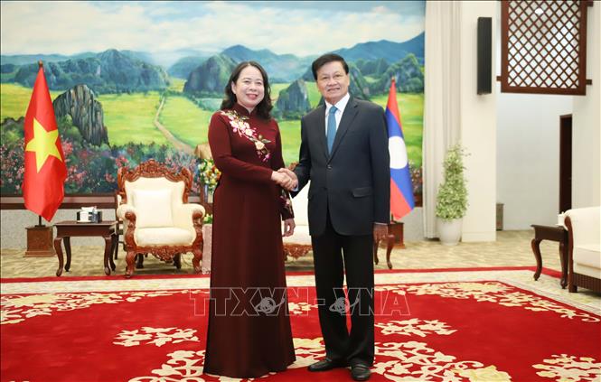 Tổng Bí thư, Chủ tịch nước Lào Thongloun Sisoulith (phải) tiếp Phó Chủ tịch nước Việt Nam Võ Thị Ánh Xuân sang thăm chính thức Lào. Ảnh: Xuân Tú - PV TTXVN tại Lào