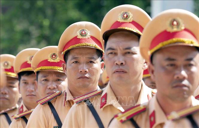 Lực lượng tăng cường là cán bộ, chiến sĩ CSGT của 33 tỉnh, thành phố. Họ là những cán bộ, chiến sĩ có kinh nghiệm trong công tác dẫn đoàn, chỉ huy giao thông. Ảnh: Phạm Kiên - TTXVN
