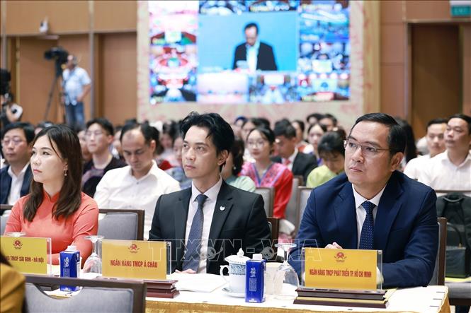 Các đại biểu tham dự Hội nghị tổng kết Chương trình và Phong trào thi đua “Cả nước chung tay xóa nhà tạm, nhà dột nát”. Ảnh: Dương Giang-TTXVN  
