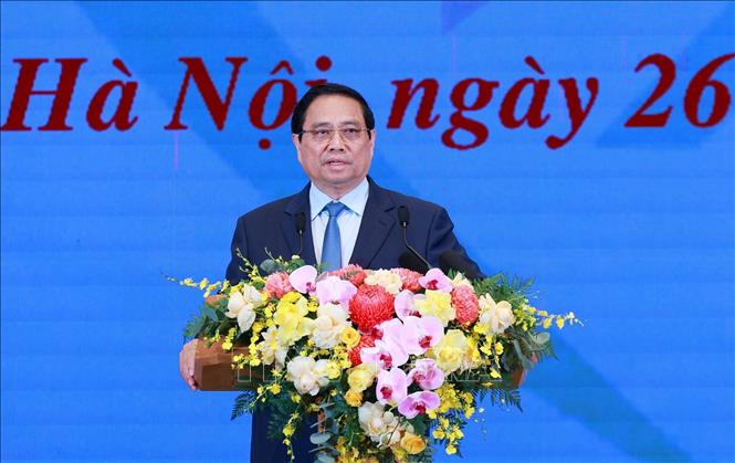 Thủ tướng Phạm Minh Chính phát biểu tại Hội nghị tổng kết Chương trình và Phong trào thi đua “Cả nước chung tay xóa nhà tạm, nhà dột nát”. Ảnh: Dương Giang-TTXVN 
