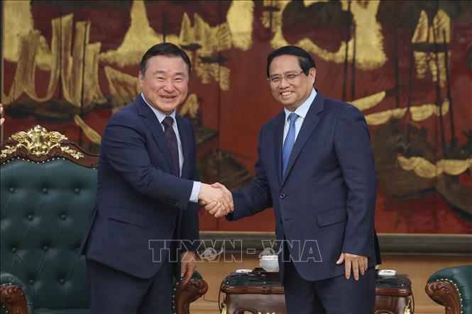 Thủ tướng Phạm Minh Chính tiếp ông Roh Tae Moon, Tổng Giám đốc điều hành Tập đoàn Samsung Điện tử. Ảnh: Dương Giang-TTXVN 