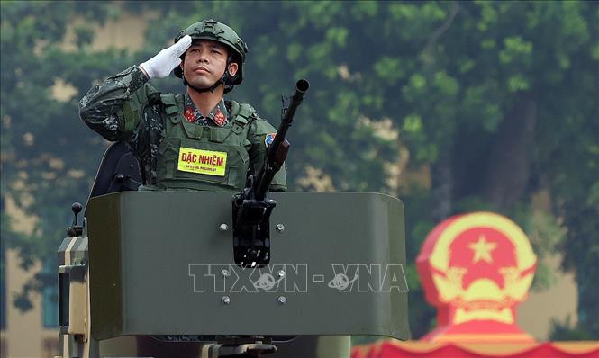 Lực lượng đặc nhiệm thuộc Bộ Tư lệnh Cảnh vệ, Bộ Công an tham gia diễu hành tại buổi lễ. Ảnh: Phạm Kiên - TTXVN