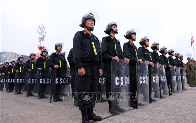Cán bộ, chiến sĩ Công an nhân dân tham dự buổi lễ xuất quân. Ảnh: Phạm Kiên - TTXVN