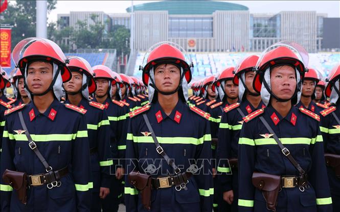 Cán bộ, chiến sĩ Công an nhân dân tham dự buổi lễ xuất quân. Ảnh: Phạm Kiên - TTXVN