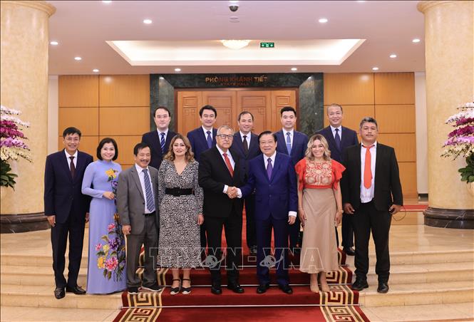 Đồng chí Phan Đình Trạc, Uỷ viên Bộ Chính trị, Bí thư Trung ương Đảng, Trưởng Ban Nội chính Trung ương và các đồng chí đoàn đại biểu cấp cao Đảng Lao động Mexico. Ảnh: Phương Hoa - TTXVN