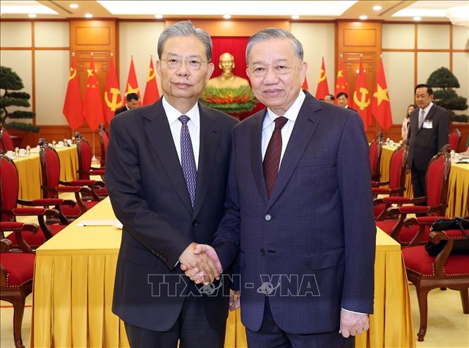 Tổng Bí thư Tô Lâm và Ủy viên trưởng Nhân đại toàn quốc Trung Quốc Triệu Lạc Tế. Ảnh: Thống Nhất – TTXVN