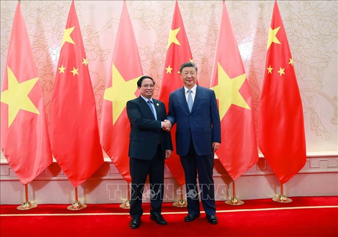 Thủ tướng Phạm Minh Chính hội kiến Tổng Bí thư, Chủ tịch nước Trung Quốc Tập Cận Bình. Ảnh: Dương Giang-TTXVN
