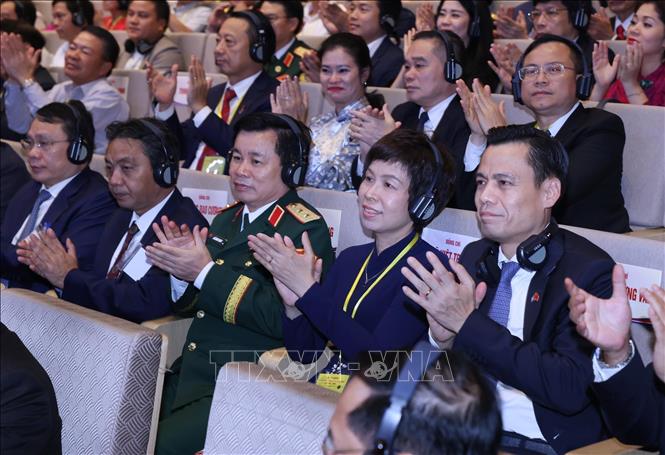 Delegates attend the meeting. VNA Photo: Lâm Khánh 