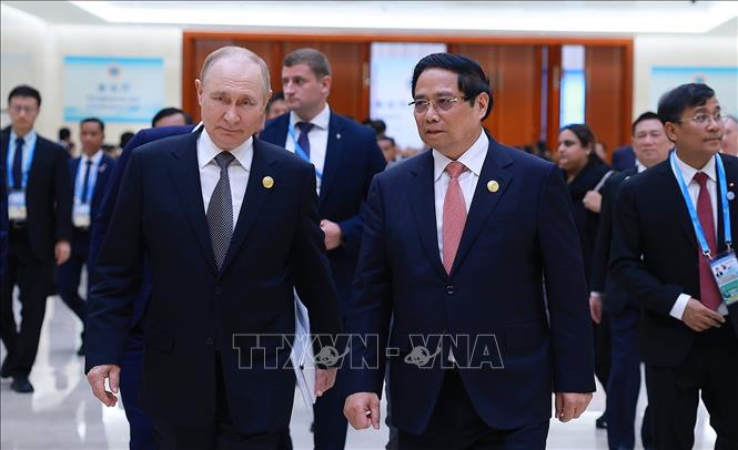 Thủ tướng Phạm Minh Chính gặp Tổng thống Nga Vladimir Putin. Ảnh: Dương Giang-TTXVN 
