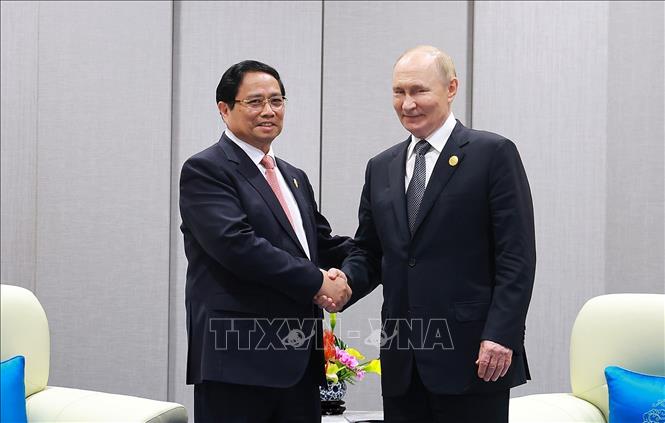 Thủ tướng Phạm Minh Chính gặp Tổng thống Nga Vladimir Putin. Ảnh: Dương Giang-TTXVN 