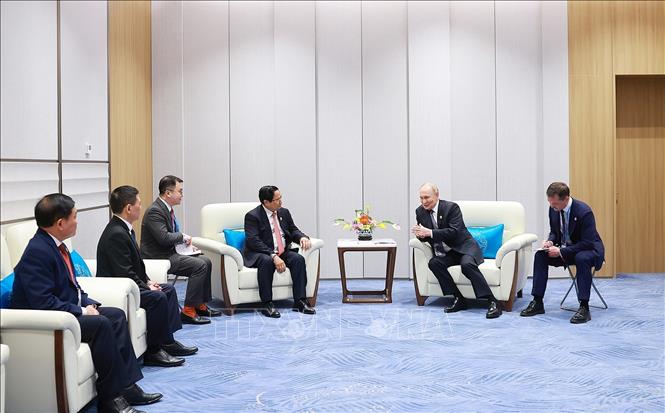  Thủ tướng Phạm Minh Chính gặp Tổng thống Nga Vladimir Putin. Ảnh: Dương Giang-TTXVN 

