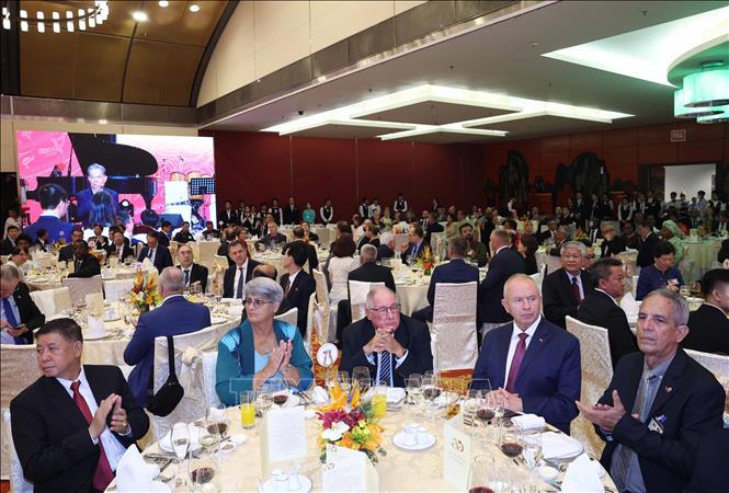 International delegates at the banquet. VNA Photo