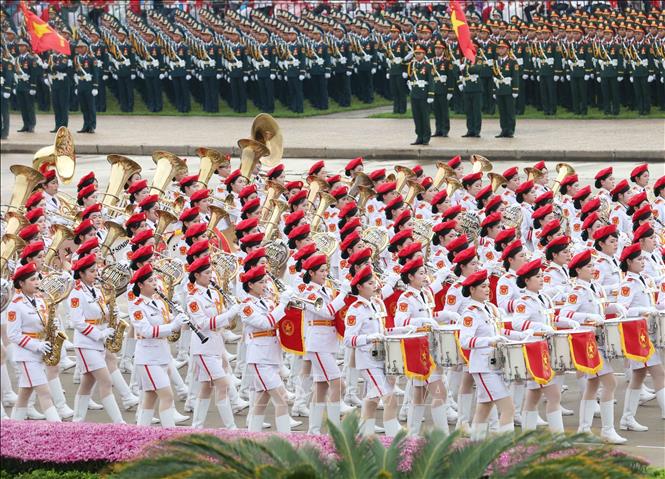Female musicians of the Military Band at the grand parade. VNA Photo
