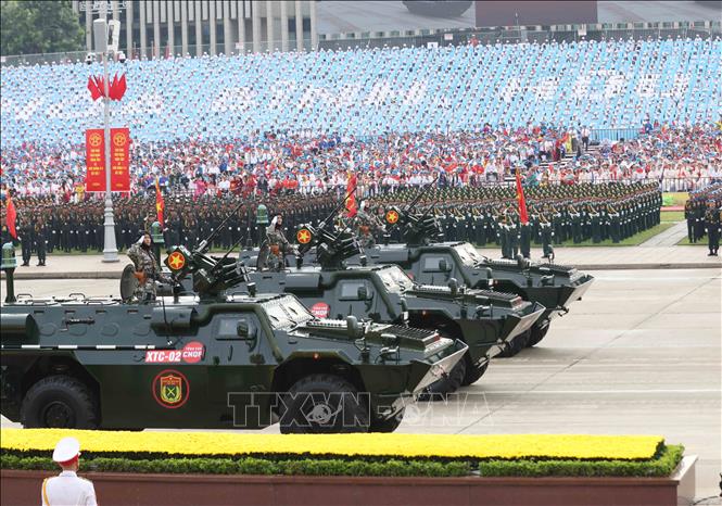 Made in Vietnam XTC-02 armored vehicles march at Ba Dinh Square. VNA Photo