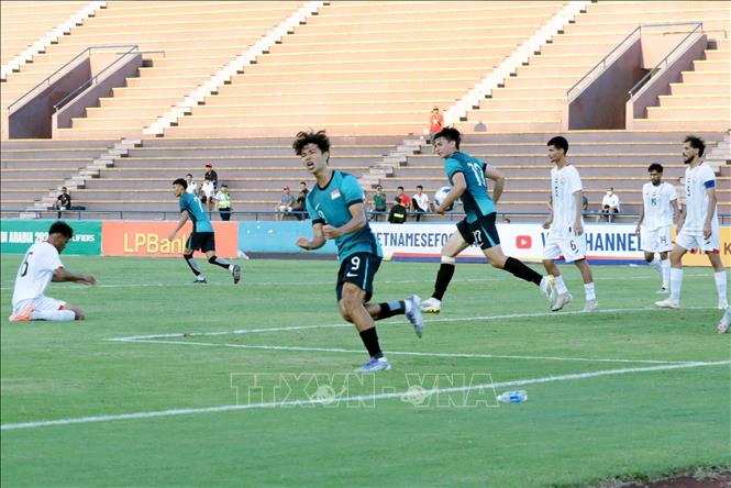 Tuyển thủ U23 Singapore mừng bàn thắng rút ngắn tỷ số cho đội nhà trước U23 Yemen. Ảnh: Tạ Toàn – TTXVN