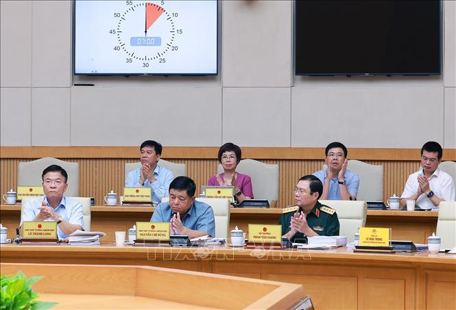 Các Phó Thủ tướng, thành viên Chính phủ và lãnh đạo các cơ quan thuộc Chính phủ tham dự phiên họp. Ảnh: Dương Giang-TTXVN 
