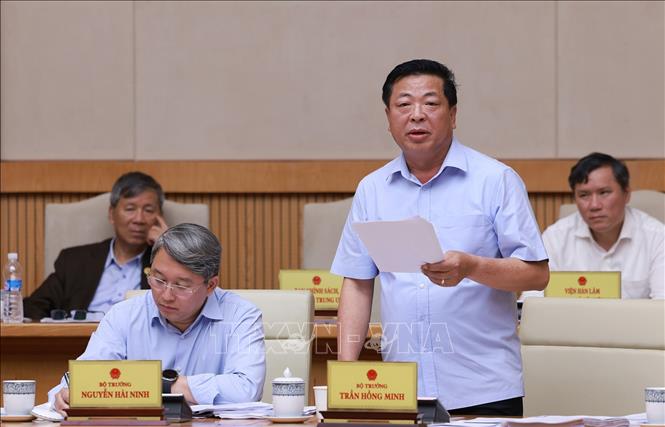 Bộ trưởng Bộ Xây dựng Trần Hồng Minh phát biểu. Ảnh: Dương Giang-TTXVN