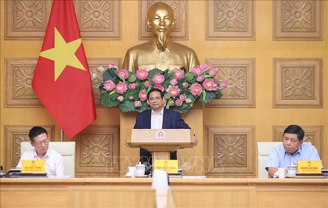 Thủ tướng Phạm Minh Chính làm việc với Hội đồng Tư vấn chính sách. Ảnh: Dương Giang-TTXVN
