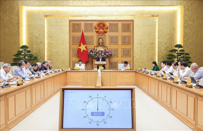 Thủ tướng Phạm Minh Chính làm việc với Hội đồng Tư vấn chính sách. Ảnh: Dương Giang-TTXVN
