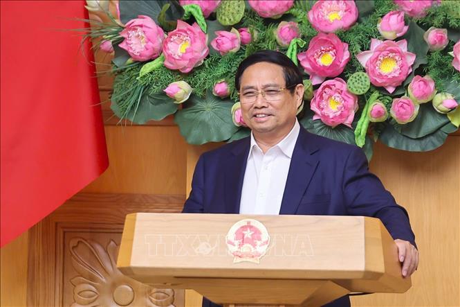 Thủ tướng Phạm Minh Chính làm việc với Hội đồng Tư vấn chính sách. Ảnh: Dương Giang-TTXVN

