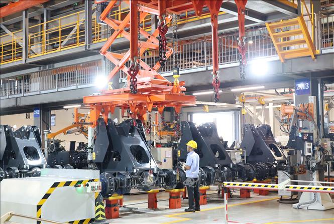 Sản xuất chế tạo máy công nghiệp tại nhà máy của Công ty TNHH cổ phần máy móc Liugong Quảng Tây (Trung Quốc). Ảnh: Công Tuyên-PV TTXVN tại Trung Quốc