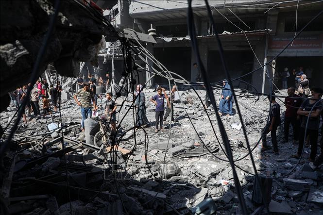 Những ngôi nhà bị phá hủy sau cuộc không kích của Israel tại Gaza. Ảnh: THX/TTXVN