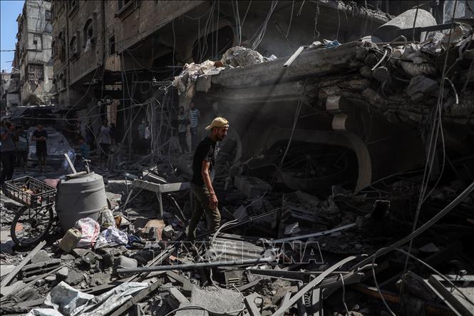 Những ngôi nhà bị phá hủy sau cuộc không kích của Israel tại Gaza. Ảnh: THX/TTXVN