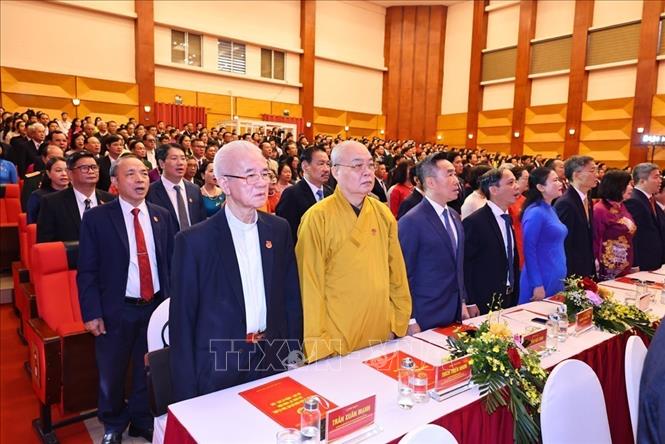Các đại biểu thực hiện nghi thức chào cờ tại Đại hội. Ảnh: Minh Đức – TTXVN