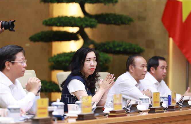 Đại diện các bộ, ngành tham dự Phiên họp lần thứ 14 của Ban Chỉ đạo Quốc gia về chống khai thác hải sản bất hợp pháp. Ảnh: Dương Giang-TTXVN 
