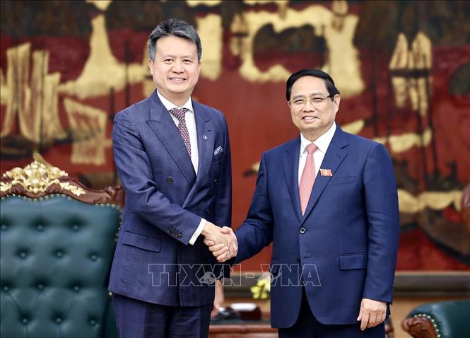 Thủ tướng Phạm Minh Chính tiếp ông Daren Tang, Tổng giám đốc Tổ chức Sở hữu trí tuệ thế giới (WIPO). Ảnh: Dương Giang-TTXVN