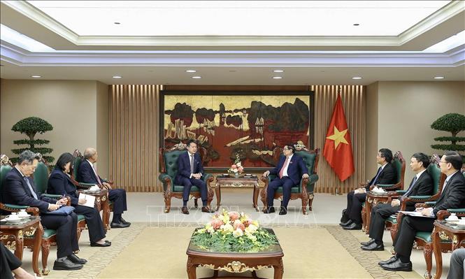 Thủ tướng Phạm Minh Chính tiếp ông Daren Tang, Tổng giám đốc Tổ chức Sở hữu trí tuệ thế giới (WIPO). Ảnh: Dương Giang-TTXVN