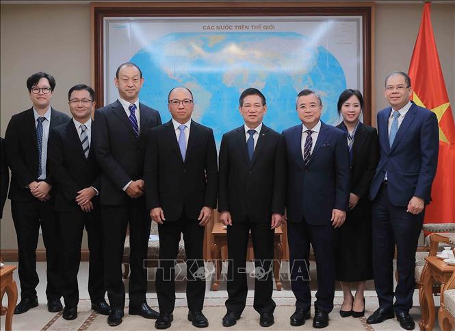 Phó Thủ tướng Hồ Đức Phớc với các đại biểu. Ảnh: An Đăng - TTXVN