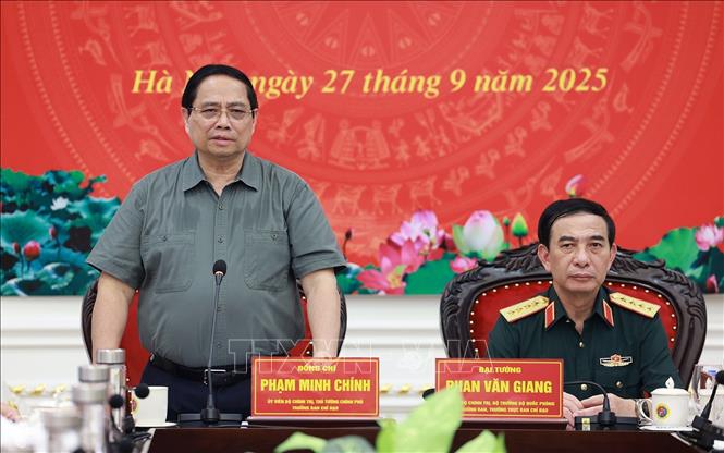 Thủ tướng Phạm Minh Chính làm việc với lãnh đạo Quân uỷ Trung ương, Bộ Quốc phòng về phát triển công nghiệp quốc phòng. Ảnh: Dương Giang-TTXVN 