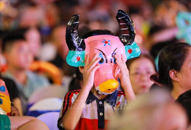 Paper mache masks are among Mid-Autumn traditional toys still favourite for children. VNA Photo