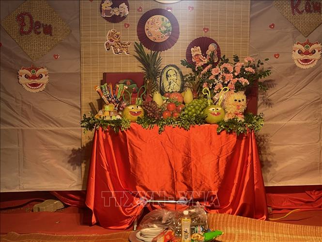 A tray of fruits and cakes is prepared for children to enjoy Mid-Autumn feast. VNA Photo