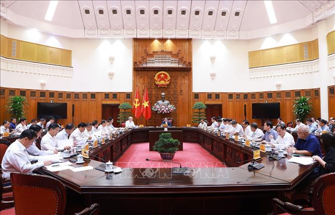 
Thủ tướng Phạm Minh Chính chủ trì cuộc họp Thường trực Chính phủ với các địa phương để tháo gỡ khó khăn, vướng mắc cho các dự án tồn đọng. Ảnh: Dương Giang-TTXVN
