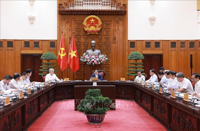 Thủ tướng Phạm Minh Chính chủ trì cuộc họp Thường trực Chính phủ với các địa phương để tháo gỡ khó khăn, vướng mắc cho các dự án tồn đọng. Ảnh: Dương Giang-TTXVN