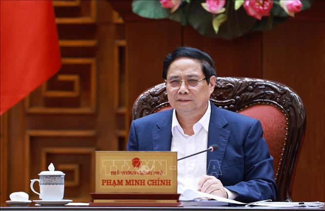 Thủ tướng Phạm Minh Chính chủ trì cuộc họp Thường trực Chính phủ với các địa phương để tháo gỡ khó khăn, vướng mắc cho các dự án dự án tồn đọng. Ảnh: Dương Giang-TTXVN 
