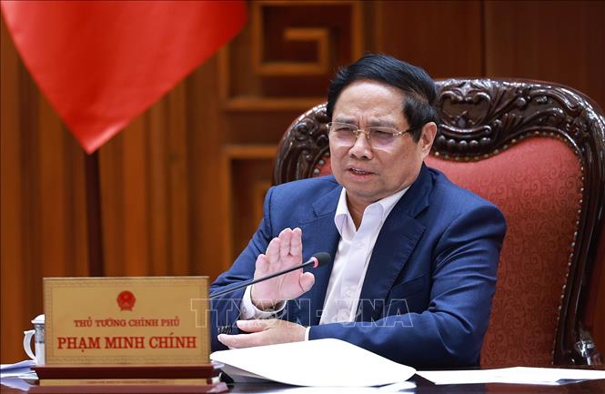 Thủ tướng Phạm Minh Chính chủ trì cuộc họp Thường trực Chính phủ với các địa phương để tháo gỡ khó khăn, vướng mắc cho các dự án dự án tồn đọng. Ảnh: Dương Giang-TTXVN 
