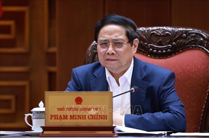 Thủ tướng Phạm Minh Chính chủ trì cuộc họp Thường trực Chính phủ với các địa phương để tháo gỡ khó khăn, vướng mắc cho các dự án dự án tồn đọng. Ảnh: Dương Giang-TTXVN 
